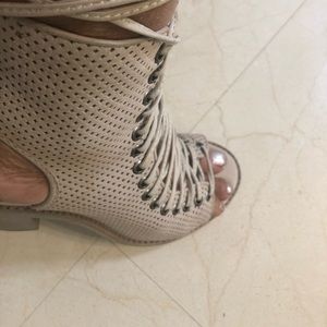 Dolce Vita ankle length suede beige color shoes.